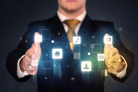 Blue social application icons in the hands of a businessman 