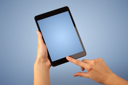 Female fingers touching blank tablet