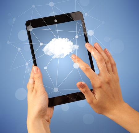 Female fingers touching tablet with cloud concept