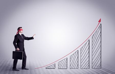 young-male-office-worker-trying-find-794315755 A young male office worker trying to find the right solution to develop a growing market concept with drawn exponential arrow.