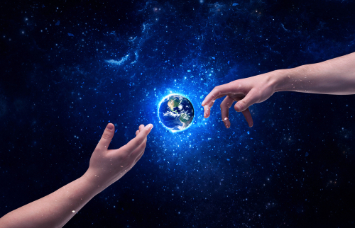 Male god hands about to touch the earth globe in the galaxy with bright shining stars and blue light illustration concept. Elements of this image furnished by NASA.