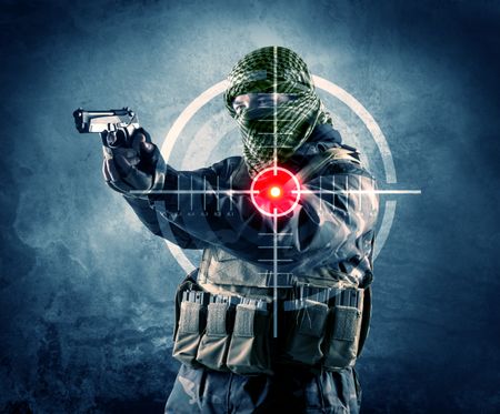 Masked terrorist man with gun and laser target on his body concept