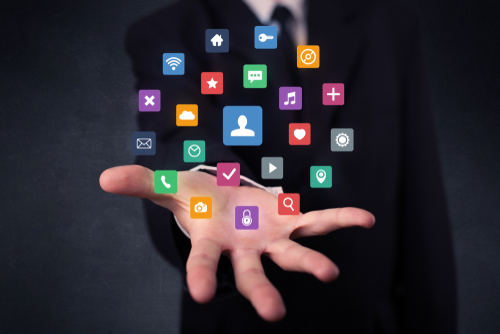 colorful-multimedia-icons-hands-businessman-797832973 Colorful multimedia icons in the hands of a businessman