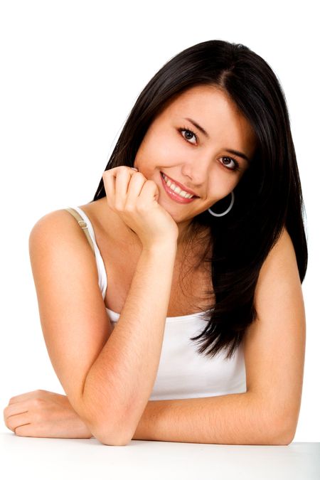 Beautiful casual woman portrait smiling over a white background