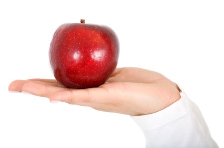 hand holding an apple isolated over a white background