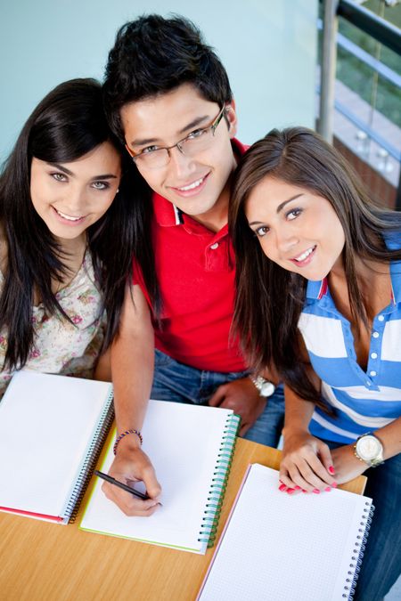 Group of students at the university with notebooks