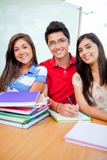 Group of students at the university with notebooks