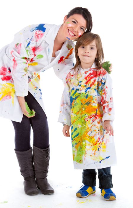 Happy woman and a kid painting with robes and smiling - isolated