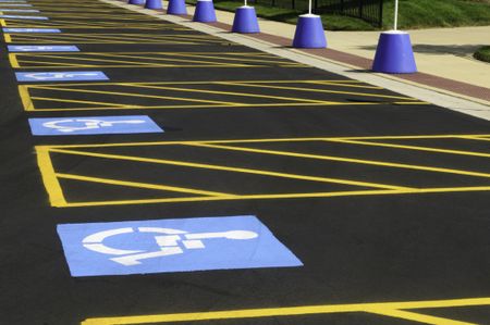 Parking spaces reserved for the disabled in outdoor lot for the public