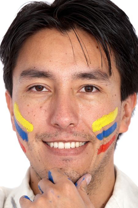 casual man portrait smiling with a colombian flag on his face - isolated over a white background