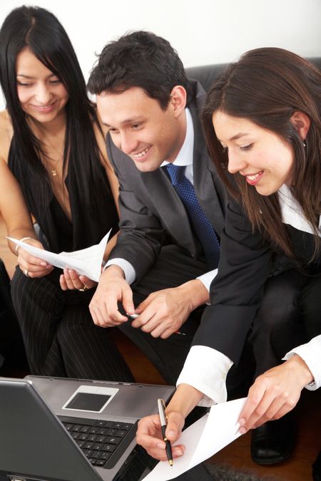 business people in a meeting on a laptop computer