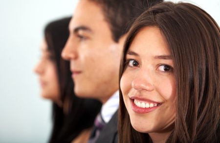 business team with a businesswoman leading it in an office