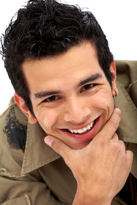 caucasian casual man portrait smiling with his hand on his chin - isolated over a white background