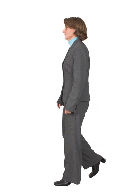 business woman walking from right to left