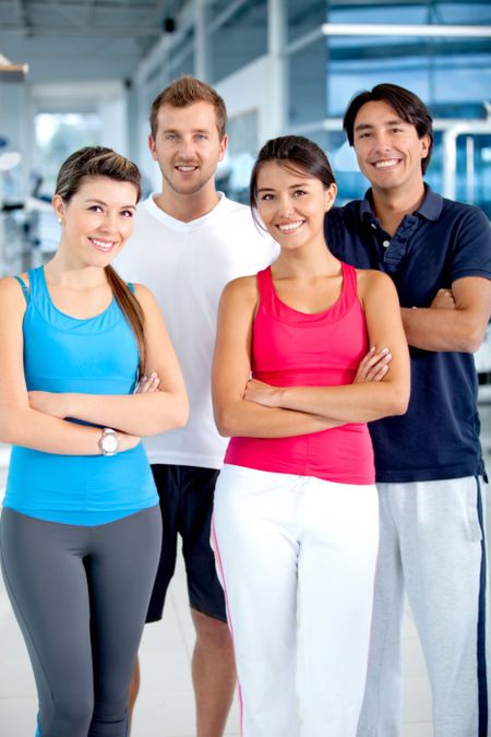 Group of people at the gym smiling
