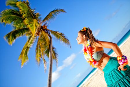 Hawaiian woman at the beach enjoying her sunny vacations