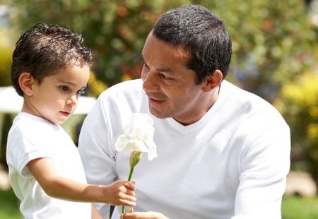 father and son sharing a nice moment outdoors