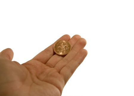 2 pence coin being offered by hand