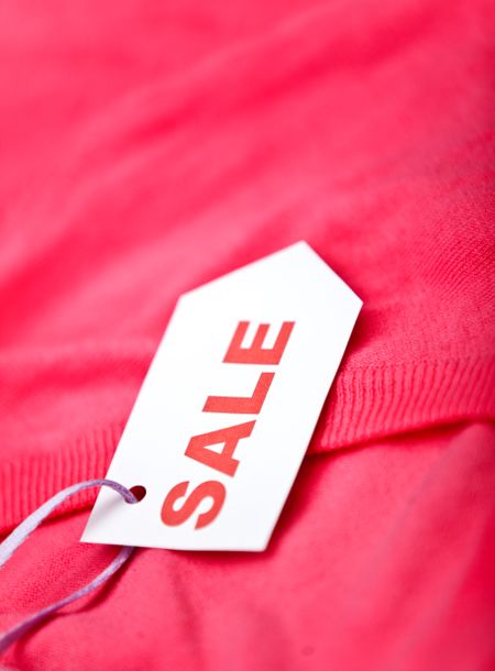 Piece of clothes displaying a sale's tag