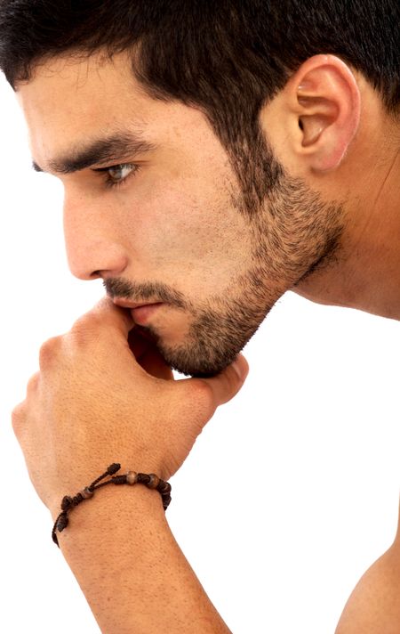 fashion male portrait looking away deep in thought - isolated over a white background