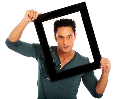 casual young adult framing his face isolated over a white background