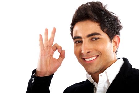 business man smiling doing the okay sign over a white background