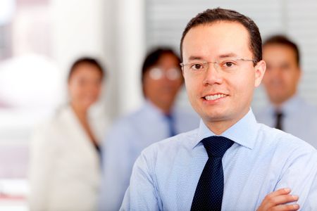 Successful man leading a business team at the office