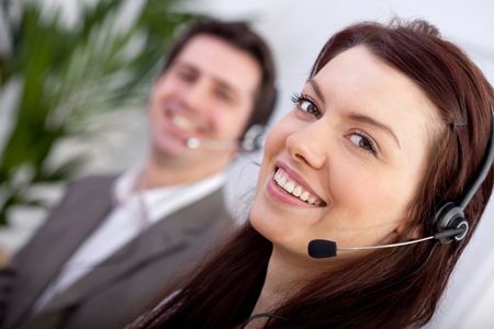 Woman with a headset in a call center