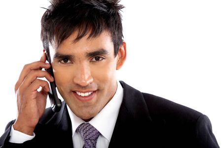 Business man on the phone smiling - isolated over a white background