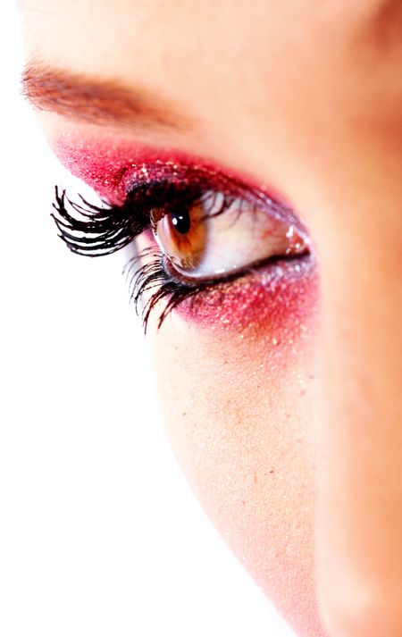beautiful female eye with make up isolated over a white background