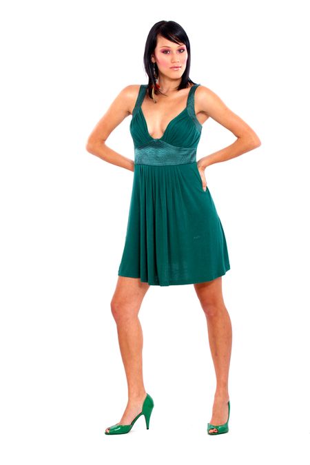 catwalk fashion woman walking in a green dress - isolated over a white background