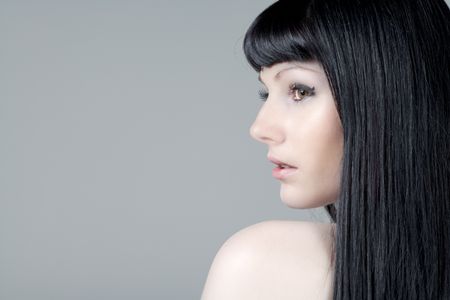 Profile of young woman in beauty style pose