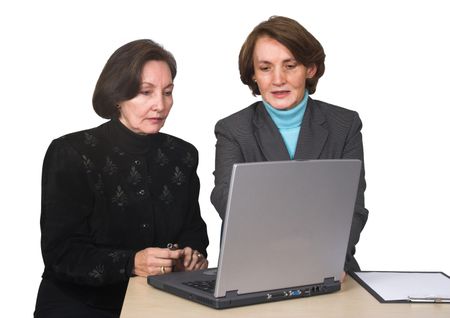 business female team with laptop over a white background