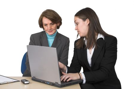 business female partners with laptop over a white background
