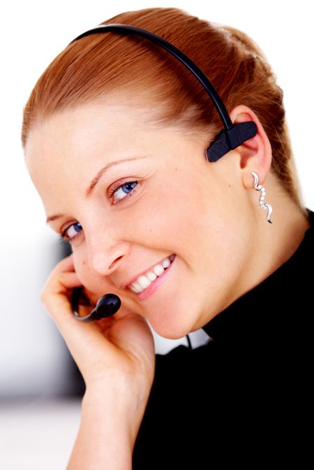 business customer service woman smiling wearing a headset in her office