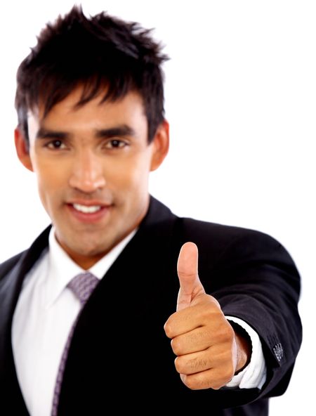 business man smiling doing the thumbs up sign over a white background