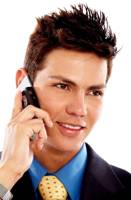 Business man on the phone smiling isolated over a white background