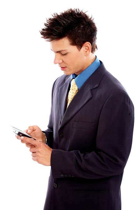 Business man on the phone sending an sms isolated over a white background