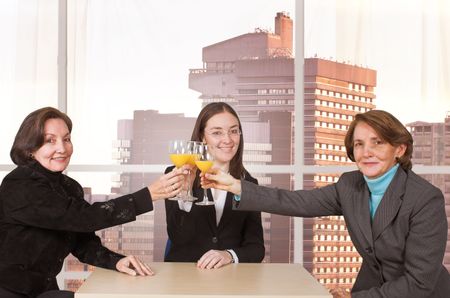 confident business women celebrating success