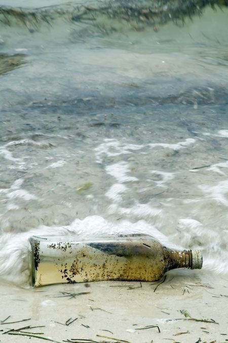 Bottle without a message on seashore