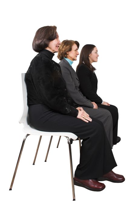 Business female management team sitting down