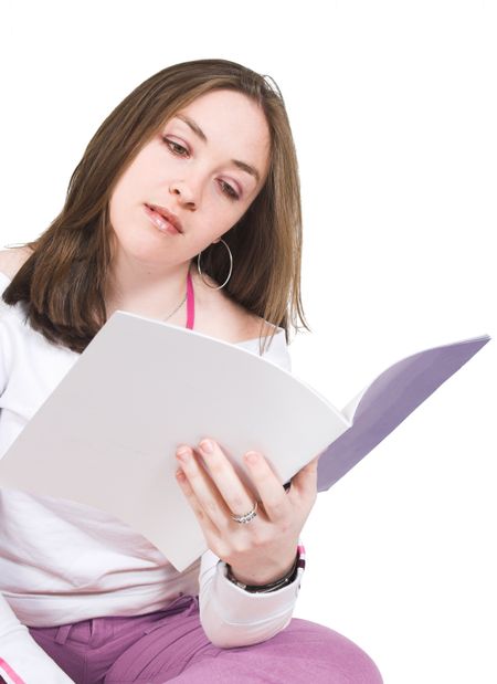 Young girl reading a book