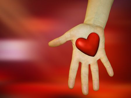 Red Heart on a Hand with a blurred red background