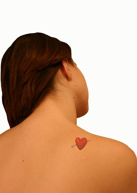 Woman's back with a Heart Tattoo on it
