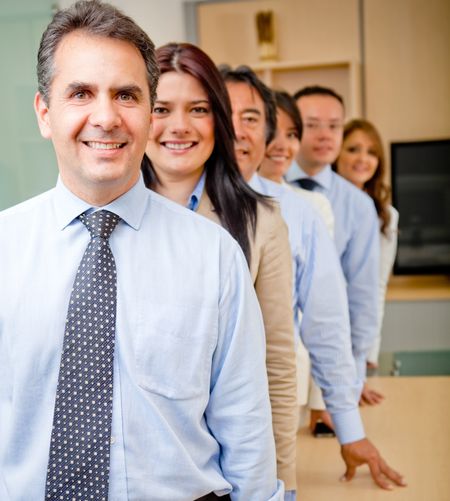 Successful business group in a row at the office