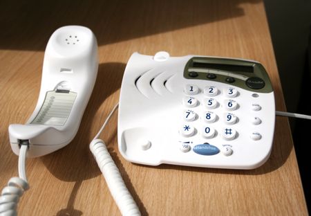 analogued telephone with handpiece up