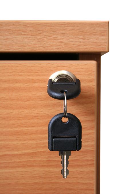 cabinet key over white