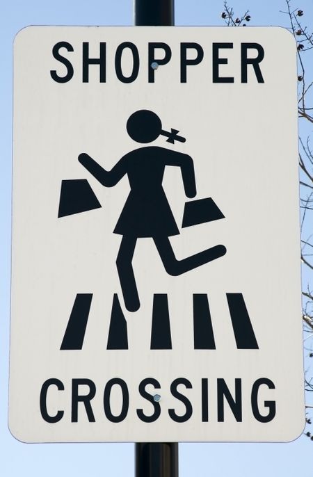 Sign for motorists and pedestrian shoppers