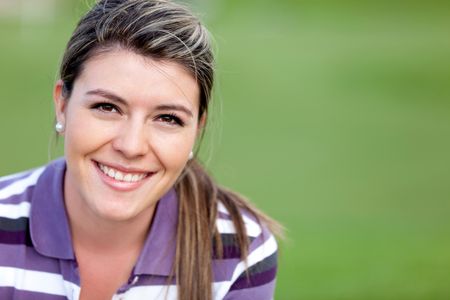 Beautiful woman portrait smiling outdoors looking very happy