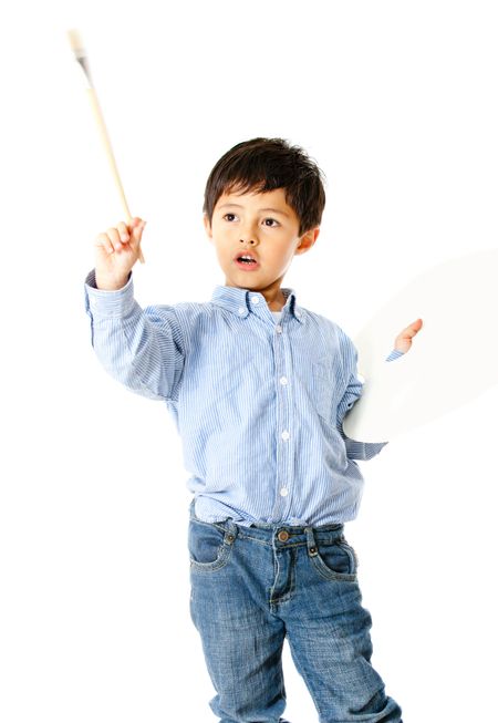 Boy playing a young artist - isolated over a white background